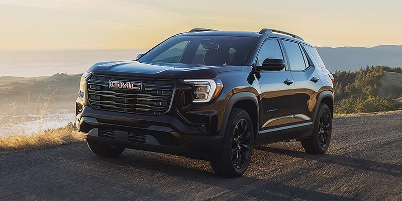 2026 GMC Terrain SUV parked along a scenic roadside near St. Clairsville, OH